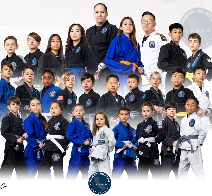 Mission Jiu Jitsu Academy team — Professor Bob with kids and teens